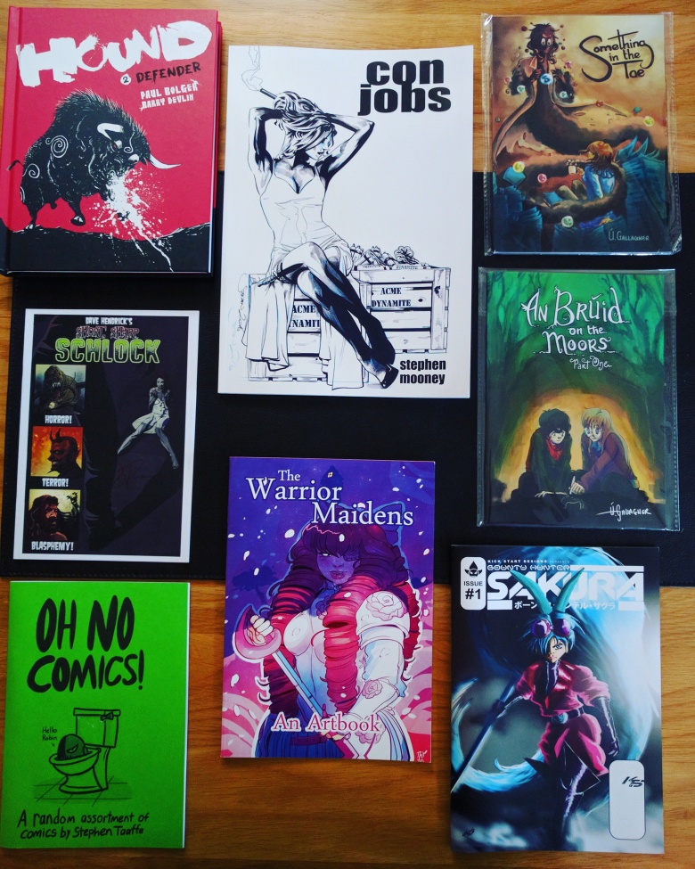 Hound 2, Con Jobs, Something in the Tae, Schlock, An Bruid on the Moors Part One, Oh No Comics!, The Warrior Maidens, Sakura #1